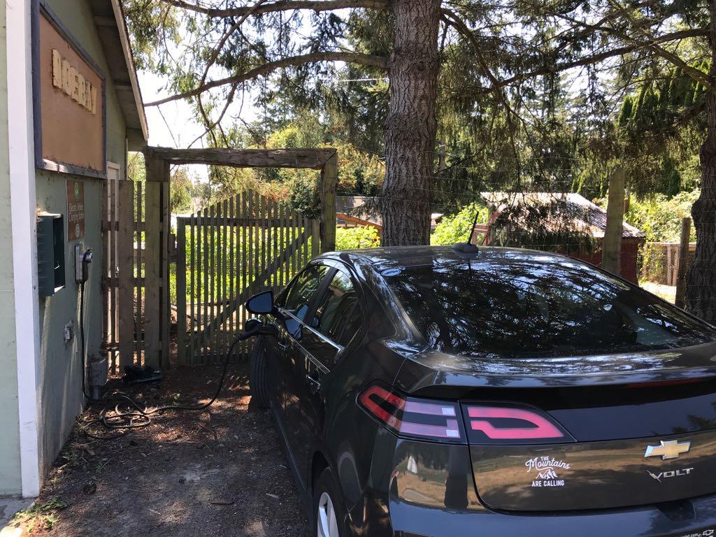 The charger is on Homestead Rd. Next to the garage.