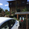 The Tesla destination chargers have been given their own slate-topped shade to allow them to blend in with their surroundings. The Palacio has been renovated very tastefully with local materials.