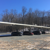 Two charging stations under the large solar array.
