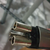 Exposed contacts on middle Tesla charger as of 12/22.