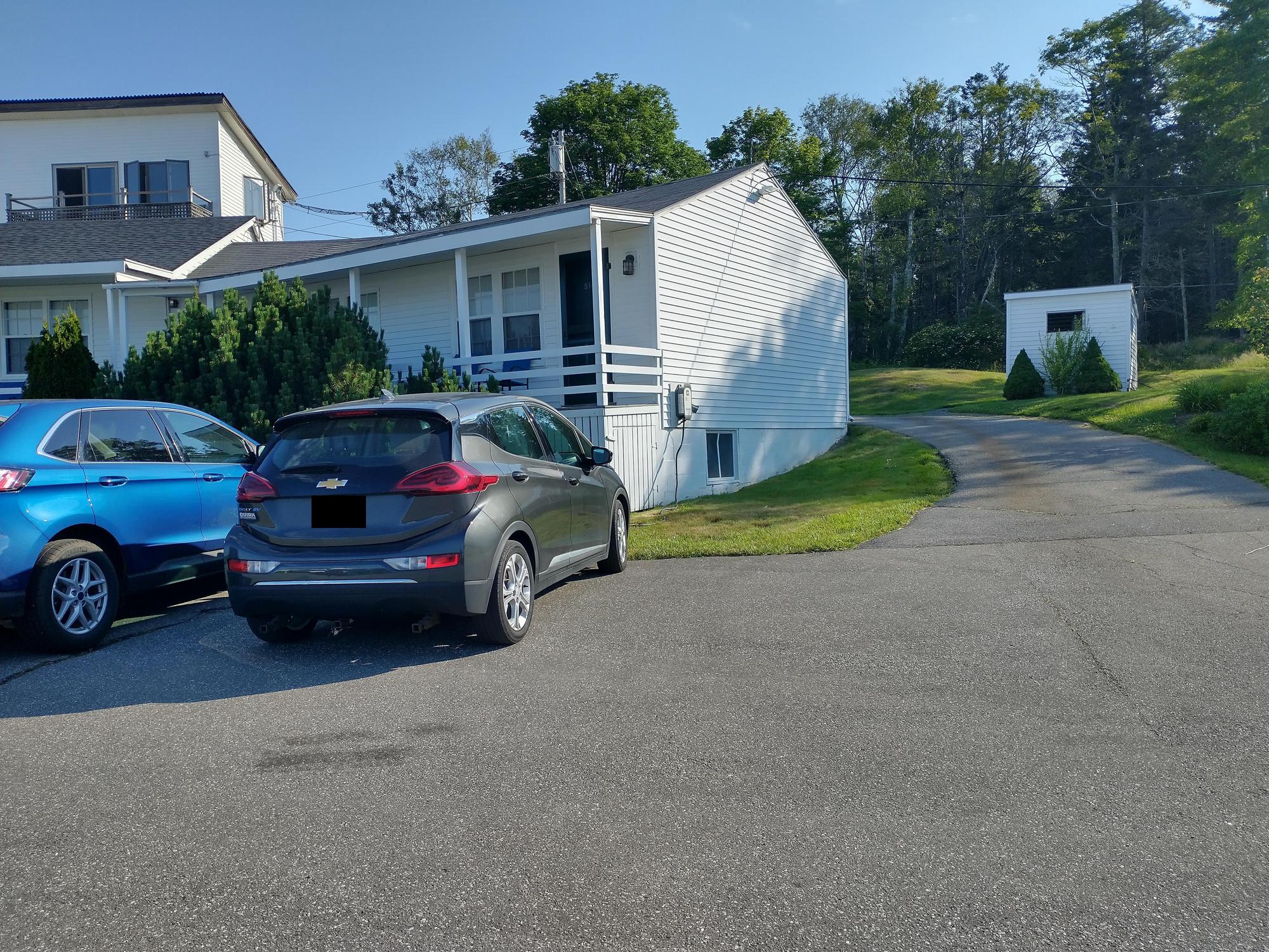 J1772 Charger is on a different building then the Tesla chargers