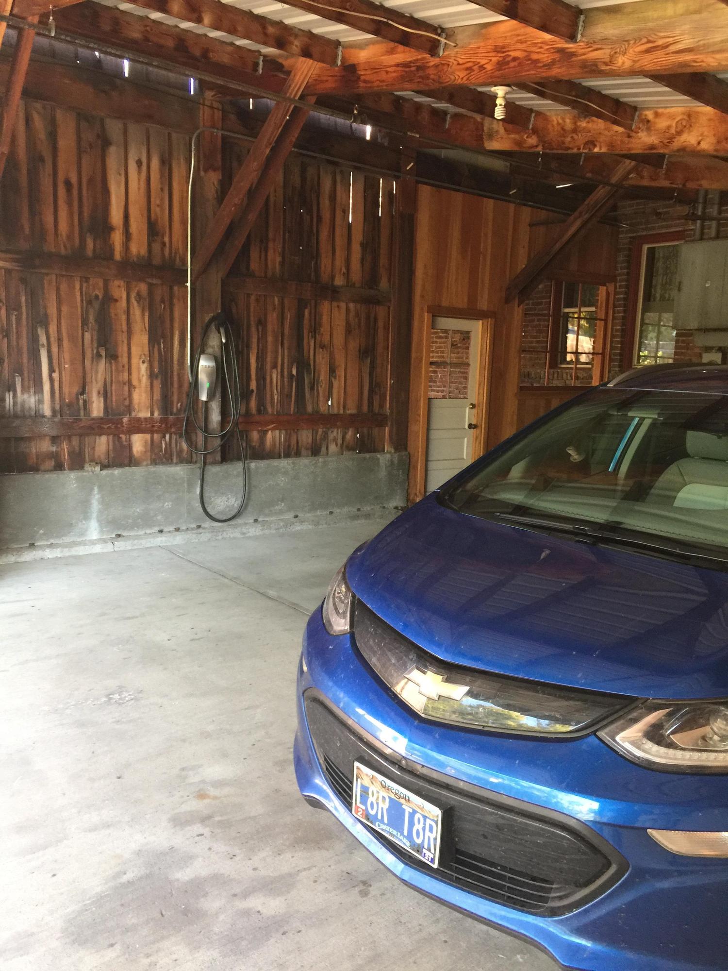 Tesla Destination Charger on the left.