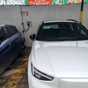 Carregando na tomada industrial de 32a