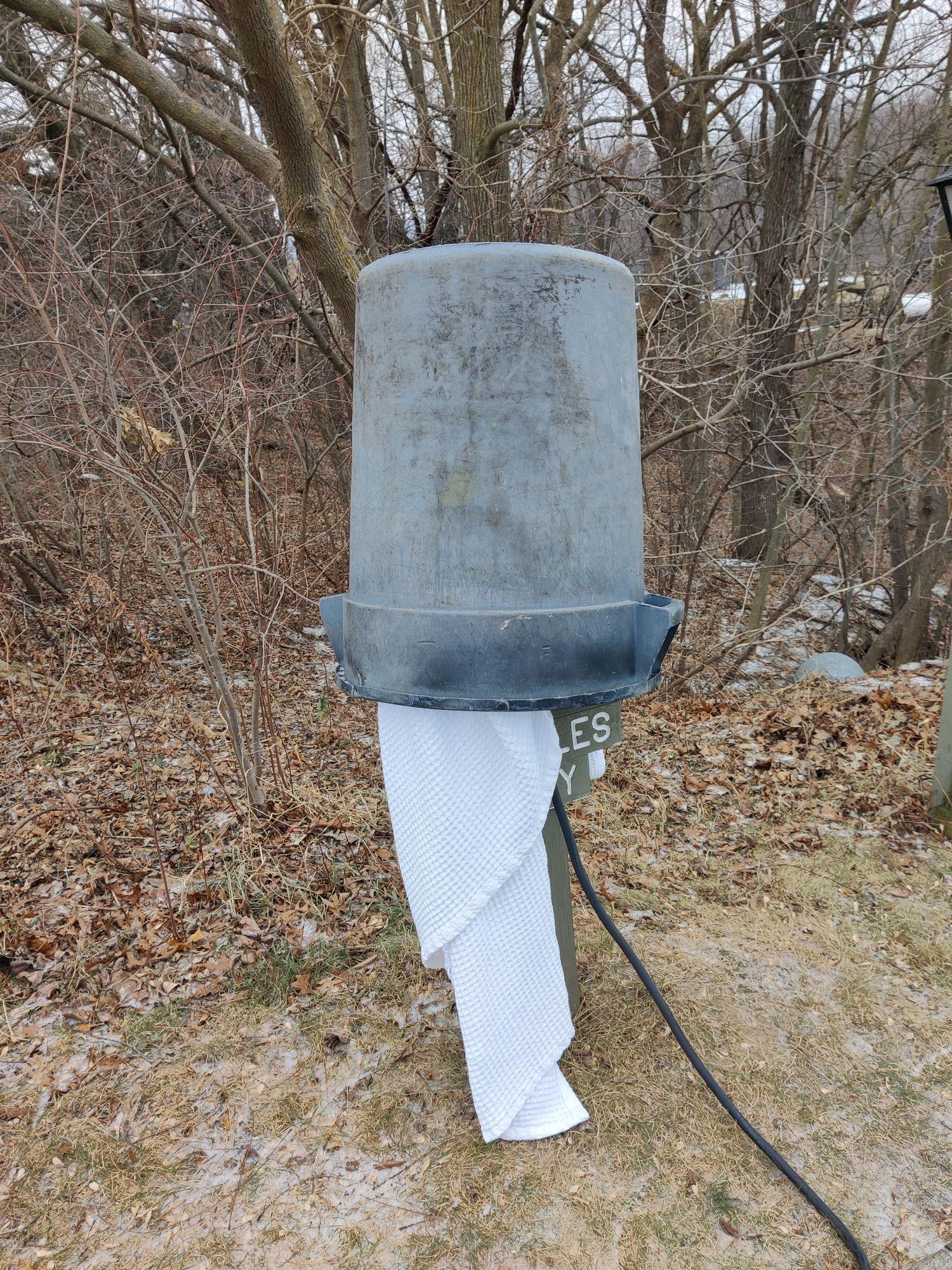 Working J1772 charger under trash can (to protect from the elements?)