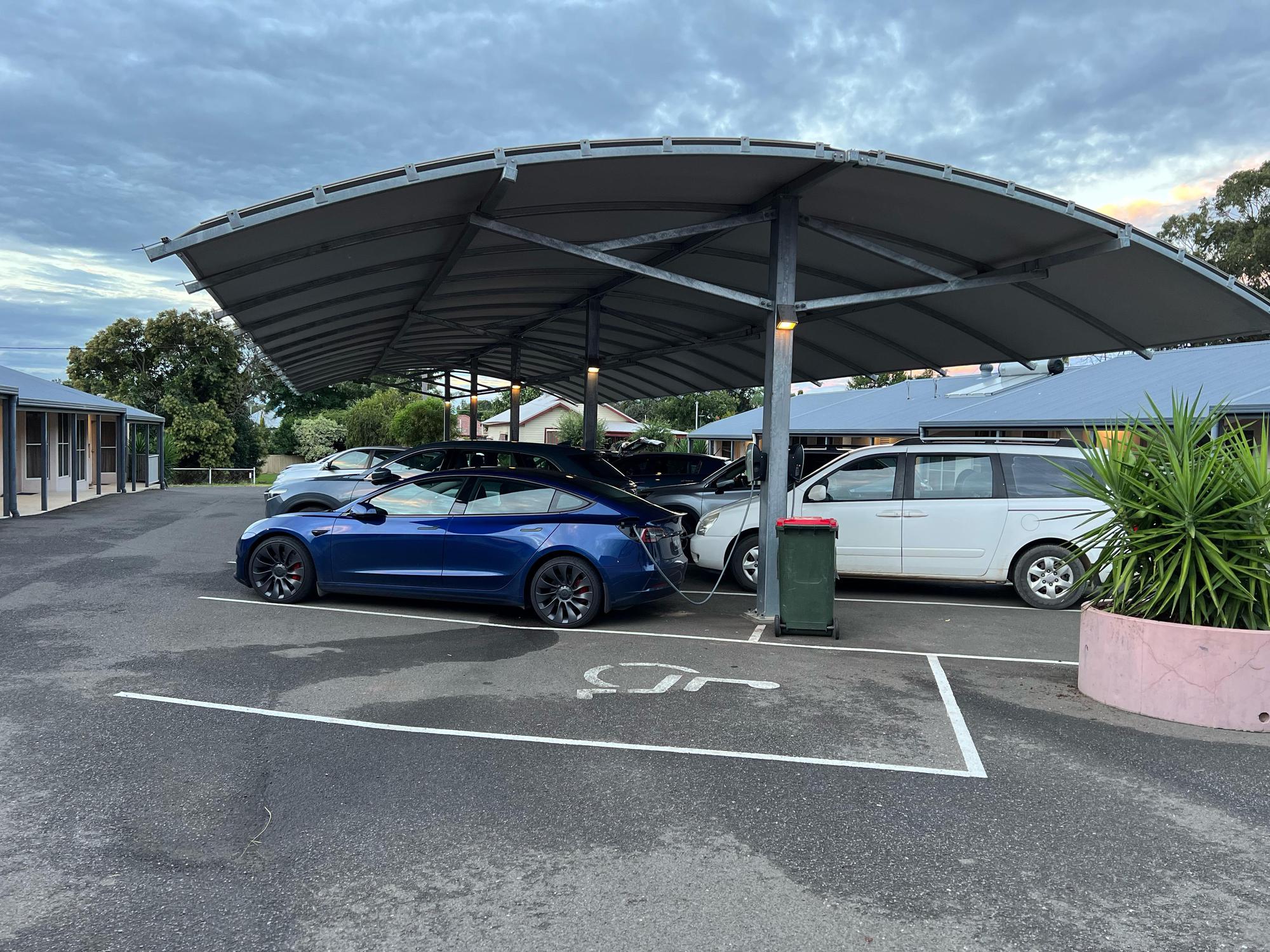 2 chargers, under cover and close to rooms