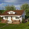 We loved staying in the cozy historic farm house with the charger just outside the back door. Laurie's Motor Inn calls this House 2